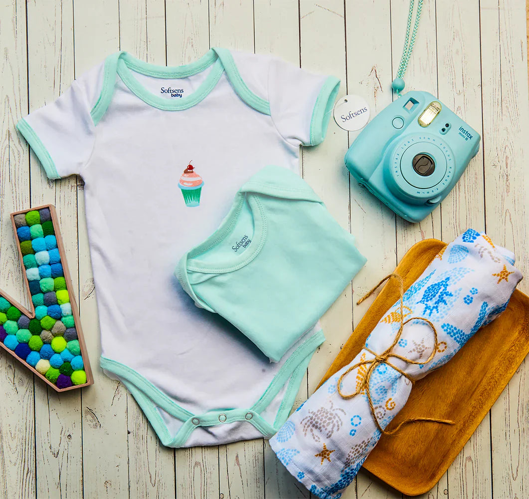 Newborn Clothing Essentials: Sleepsuits, Rompers &amp; Swaddles Explained